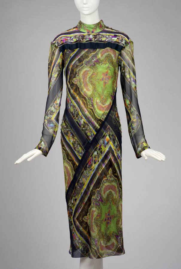 A Dries Van Noten dress of printed silk from 2008, in green and violet kaleidoscope patterns.