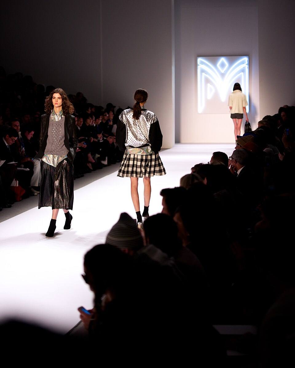 Models walking a New York fashion week runway.