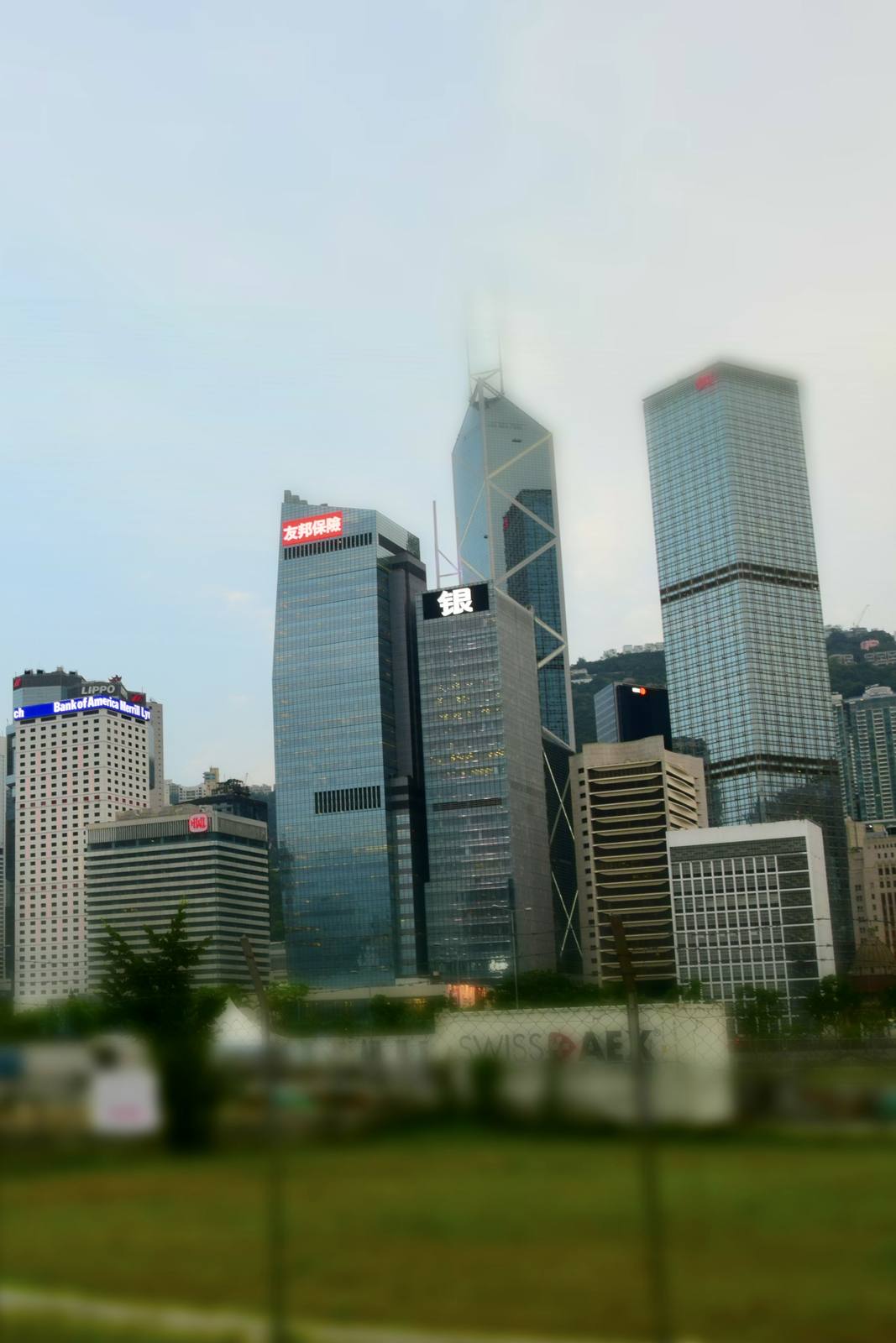 The skyline of Central, Hong Kong, with the AIA building visible.